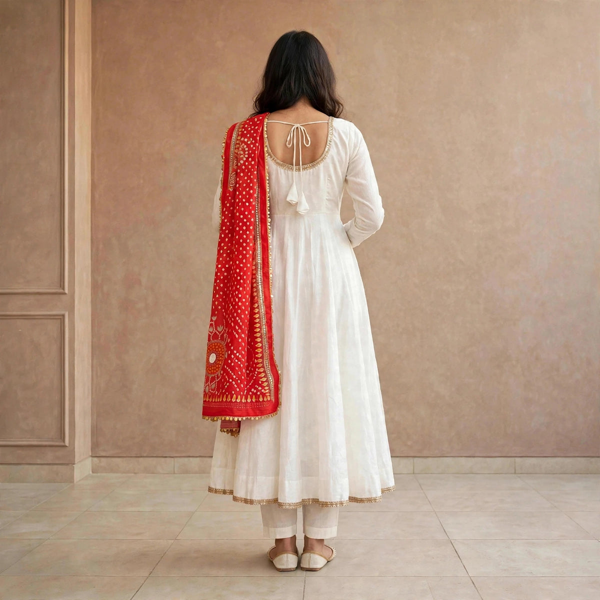 Less worked Anarkali suit with Bandhani dupatta