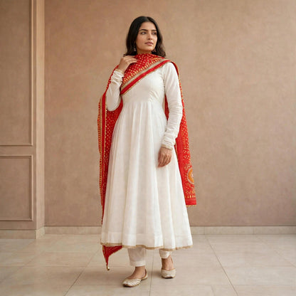 Less worked Anarkali suit with Bandhani dupatta