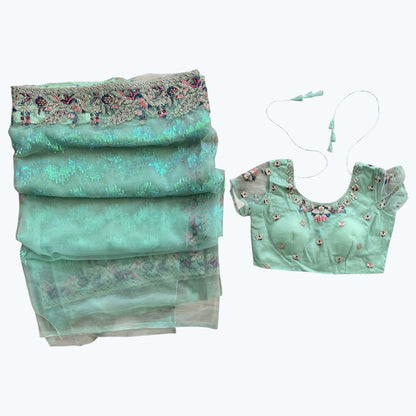 Sequins boutique saree and blouse set.