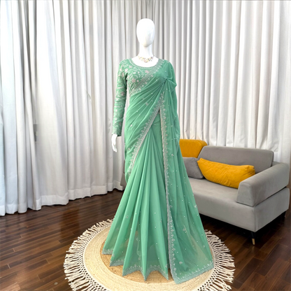 Sequined and pearl work saree and blouse set.